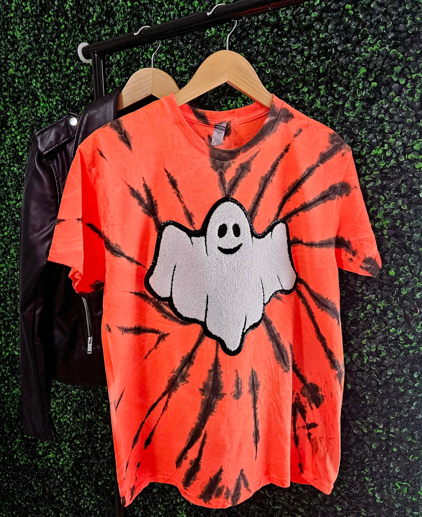 Tie Dye (orange and black) Halloween short sleeve t-shirt with a chenille ghost patch -front