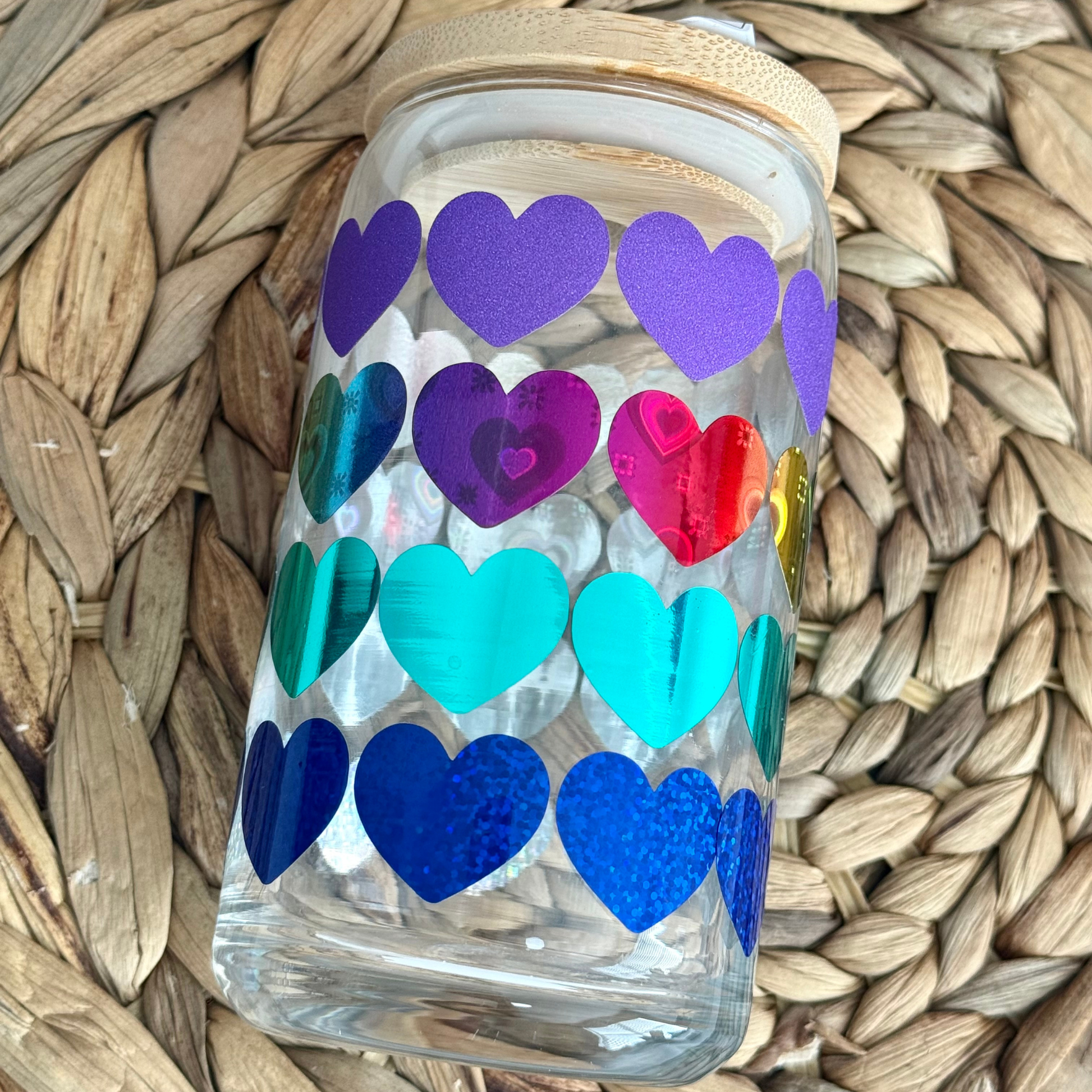 16oz beer can glass tumbler with wrap-around holographic rainbow hearts, featuring a sustainable bamboo lid and reusable glass straw, ideal for aesthetic home cafe iced coffee and gifts.