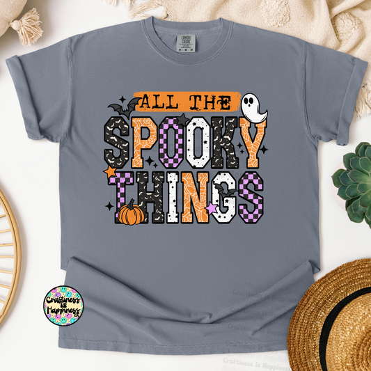 Gray t-shirt with 'All the Spooky Things' Halloween design on a light background