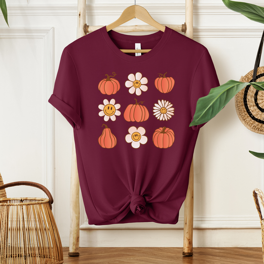 Burgundy short sleeve t-shirt with retro daisies and pumpkins- front