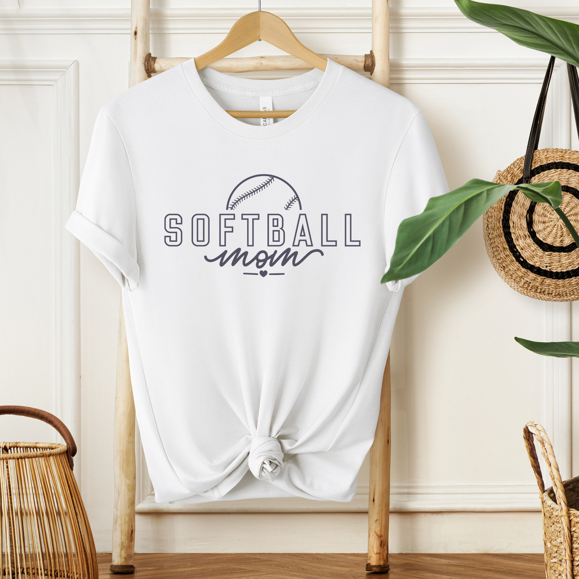 white short sleeve t-shirt  "Softball Mom" saying with a softball-front